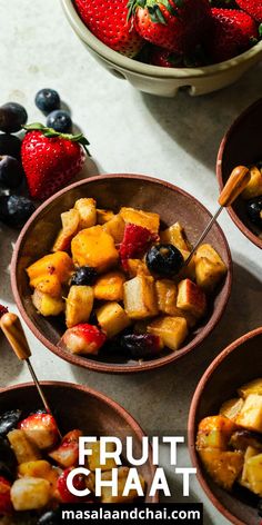 fruit chaat served in bowls with strawberries and blueberries