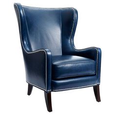 a blue leather chair with studded trim