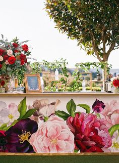 flowers are on display at an outdoor wedding