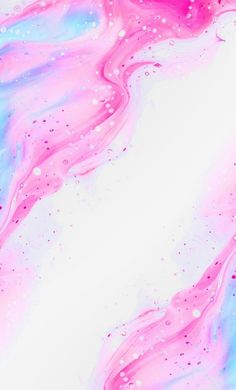 an abstract painting with pink, blue and white paint on it's surface is shown