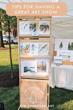 a sign that says tips for having a great art show on display in the grass