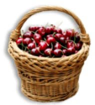 a wicker basket filled with red cherries