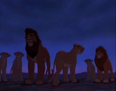 the lion king is standing in front of other lions