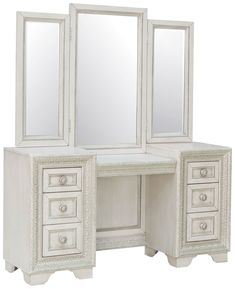 a white dressing table with two mirrors and drawers