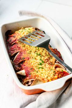 a casserole dish with meat and rice in it