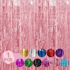 a pink background with lots of different colored foils on it and the number 1