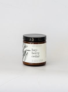 bay berry cedar body scrub in a glass jar on a white background with the words bay berry cedar