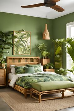 a bedroom with green walls and palm leaves on the bed, ceiling fan and dresser