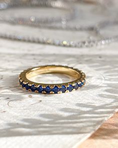 The Audrey Ring has all the royal blue vibes. Perfect for stacking with other rings in your collection or for a simple chic look. This ring is 18k gold plated silver with cubic zirconia stones. This is for one ring. Ring sizes: 6,7,8 Blue Gold Ring, Grad Rings, Blue Stones Jewelry, Royal Rings, Ring With Stone, Blue Vibes, Graduation Rings, Saphir Ring, Rings Ceremony