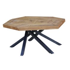 an octagonal wooden table with black metal legs and a geometric design on the top, against a white background