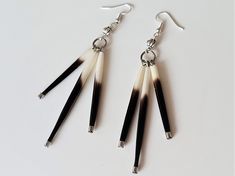 Ethnic earrings. 3 thorns, porcupine needles on each earring. Native American, Indian. Porcupines are a protected species, we only use the picks of porcupines killed by accident on the roads. Length 8.5 cm + hooks Shipping with tracking for France, If you want tracking abroad, choose the "economic" option when paying. Porcupine Earrings Seed Beads, Beaded Earrings With Porcupine Quills, Beading With Porcupine Quills, Beaded Porcupine Quill Earrings, Porcupine Quill Earrings, Ethnic Earrings, American Indian, Native American, Favorite Jewelry