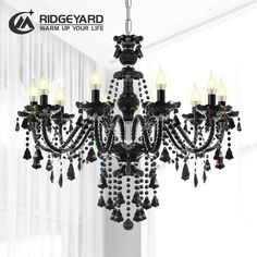 a black chandelier hanging from the ceiling