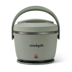 the crockpot is sitting on top of a white table