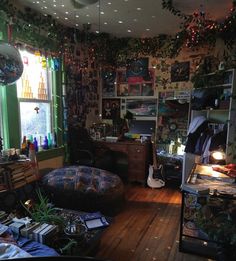 a room filled with lots of clutter and decorations