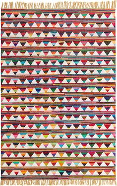 a multicolored rug with fringes and triangles