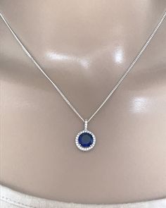 Sterling Silver Blue Sapphire Pendant Necklace Simple Necklace, Minimalist Necklace and Elegant Necklace Blue Sapphire is the birthstone for September; this makes a great gift for those loved ones born in September Metal: All components are made from solid .925 Sterling Silver Stone: Cubic Zirconia Stone size: 8mm Stone carat weight: 2 ct Measurement: pendant height is 16mm and 11mm wide Choose Chain Length You can find other CZ and Birthstone Jewelry in my shop here https://www.etsy.com/shop/Li Deep Blue Necklace, Blue Sapphire Necklace Simple, Sapphire Necklace Simple, Sapphire Jewelry Necklace, Blue Diamond Necklace, Sapphire Jewelry Set, Morganite Necklace, Blue Stones Jewelry, Sapphire Pendant Necklace