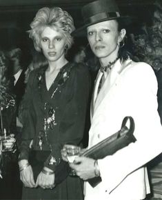 black and white photograph of two women dressed up