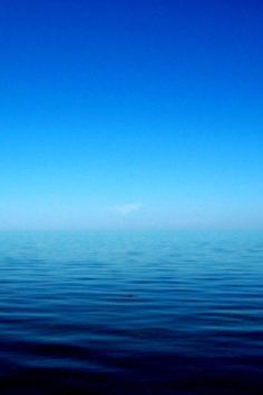 the ocean is very calm and blue