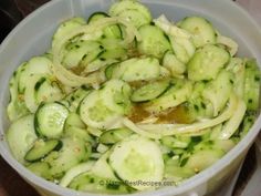 cucumbers are being cooked in a pot on the stove