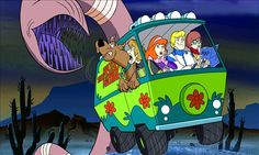 the scooby gang is riding in an old vw bus with its door open