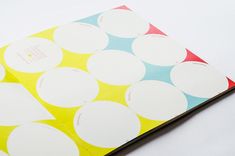 a close up of a book with circles on it