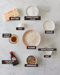 ingredients to make cake mix laid out on a counter top, including flour, sugar, butter, and eggs