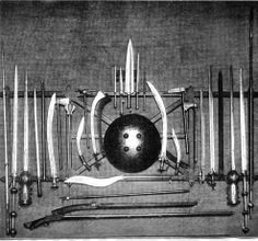 an old black and white photo with many different types of swords, knives and other items