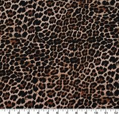 an animal print fabric with brown and black spots