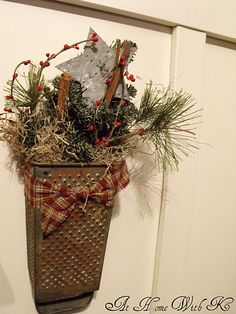 a christmas decoration hanging on the door