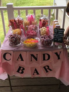 a candy bar is set up on the porch