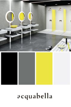 the interior of a bathroom with yellow and gray colors on the walls, mirrors and sinks