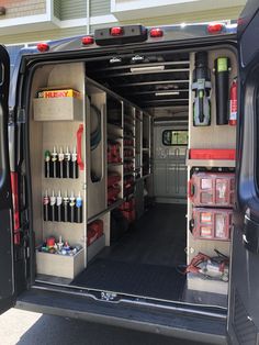 the back end of a van filled with tools