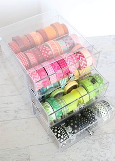 a stack of washi tapes sitting on top of a counter