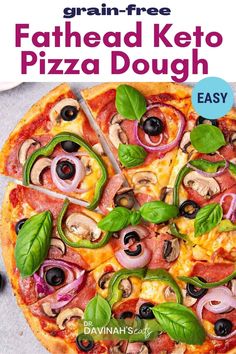 a pizza with olives, pepperoni and other toppings on it is featured in the cover of grain - free father's keto pizza dough