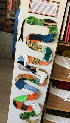 there are many pairs of shoes hanging on the wall