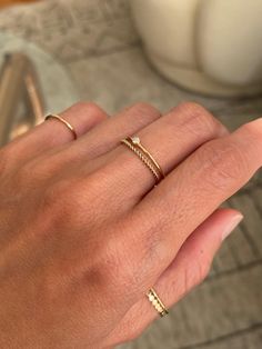 these are stackable dainty gold rings that are great to stack and layer with other gold rings. Simple Ring Ideas, Minimalist Ring Stack, Dainty Gold Ring Stack, Simple Ring Stack, Everyday Ring Stack, Minimalist Rings Stacking, Stacking Rings Ideas, Gold Rings Aesthetic, Daily Rings