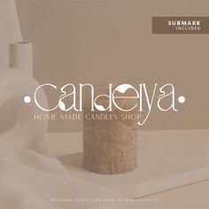 a candle that is sitting on top of a table with the words candleya in front of it