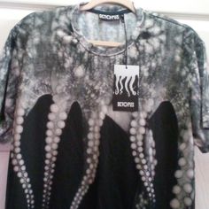 a black and white shirt with an octopus on it