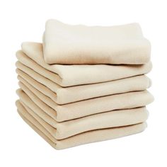 a stack of folded towels sitting on top of each other