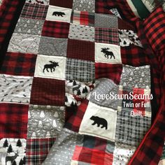 a red and black plaid quilt with bears on it