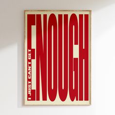 a red and white poster hanging on the wall