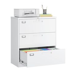 an office file cabinet with two drawers and a printer on top