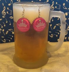 a mug with some beer and music notes on it