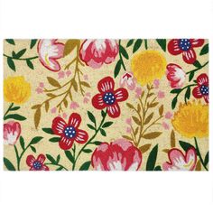 an area rug with flowers and leaves on it