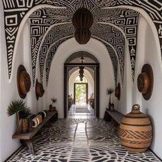 the hallway is decorated with black and white designs