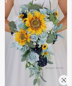 a bridal bouquet with sunflowers and succulents