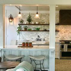 the kitchen is clean and ready to be used as a dining room or living room