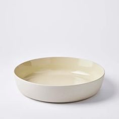 a white bowl sitting on top of a table