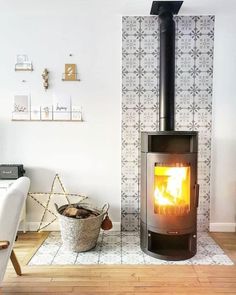 a wood burning stove in a white living room