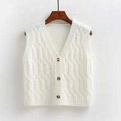 Sweater Vest Women Korean Fashion Sleeveless Knitwear Short Outerwear 2024Bust:96cmLength:48cm Trendy White Winter Tank Top, Trendy White Tank Top For Winter, Knitted Sleeveless Fall Top, Casual Knitted Tank Top For Fall, Casual Knitted Tank Top For Winter, Sleeveless Knitted Fall Tops, Fall Sleeveless Knitted Top, Casual Cable Knit Sleeveless Tank Top, Sleeveless Cable Knit Sweater For Spring